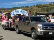 A thumb nail view of Grand Lake, Colorado during Constitution Week in September looking at another entry in the parade; click here to open a window with a larger picture.